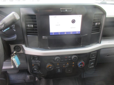 Ford F-450 dashboard and infotainment screen with center console controls.