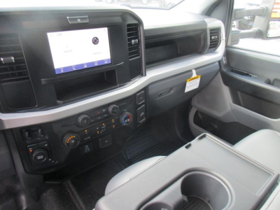 Ford F-450 interior front cabin with touchscreen infotainment display and control panel visible on dash.