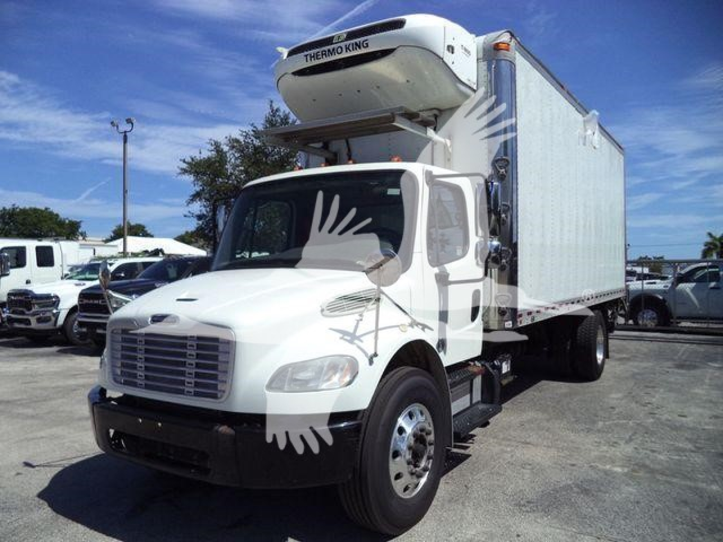 Freightliner M2 106 refrigerated truck with Thermo King unit on top; cab and box visible; license-plate area not shown; some text on the Thermo King unit may be visible.