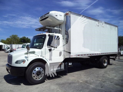 2019 Freightliner M2 106 refrigerated box truck with a front-mounted refrigeration unit on top of the cab. Side view shows large insulated cargo box.
