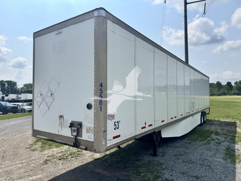 Trailer side and rear of a used 2017 Wabash dry van trailer showing VIN and stock number markings.
