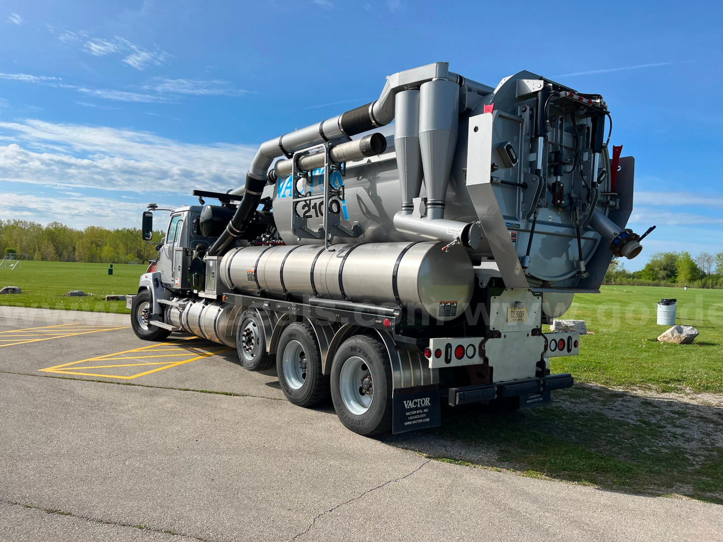 Vehicle side and rear view of a 2020 Western Star Vactor 2100PD sewer jetter truck with large vacuum tank, hoses, and mechanical components.