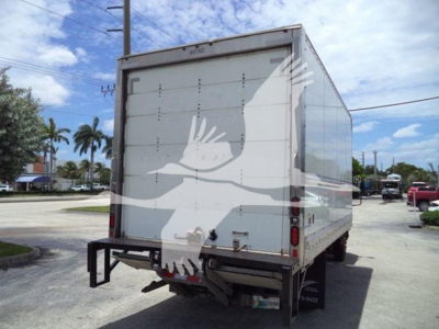 Isuzu NPR HD box truck rear view with closed cargo doors, chrome rear bumper, and license plate area visible.
