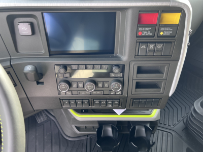 Volvo VNL64T840 cab dashboard with touchscreen, control panels, and switchgear in-view