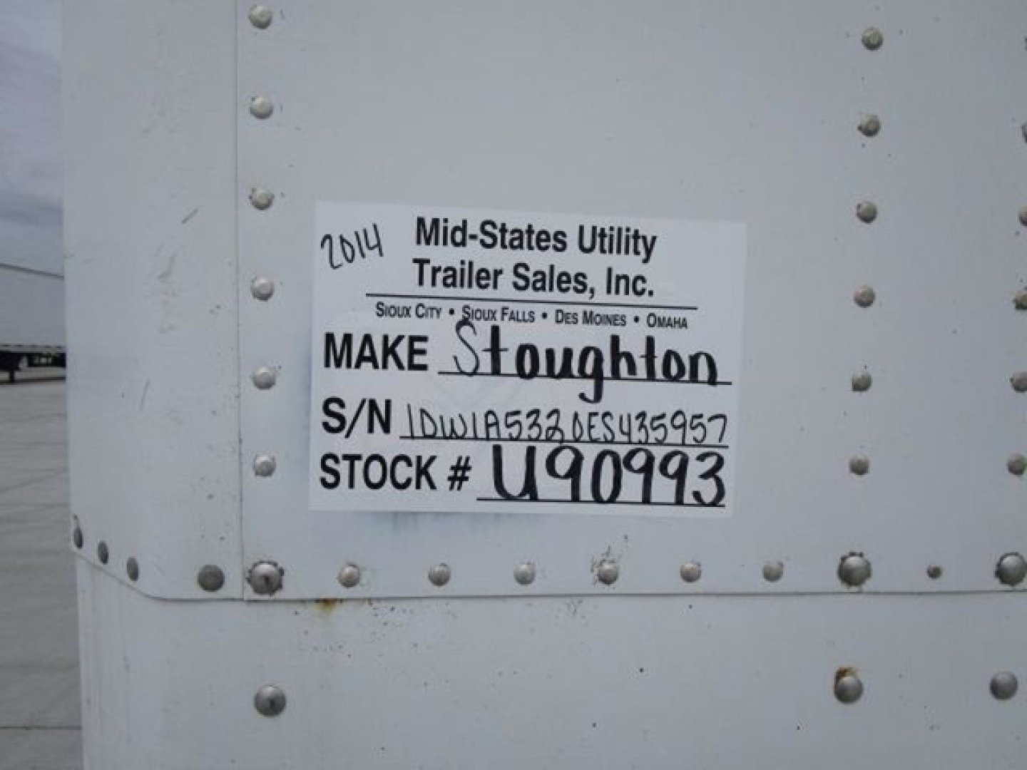 Trailer side with white label: 2014 Mid-States Utility Trailer Sales, Inc. Make Stoughton S/N 1DW1A5320ES435957 Stock # U90993.