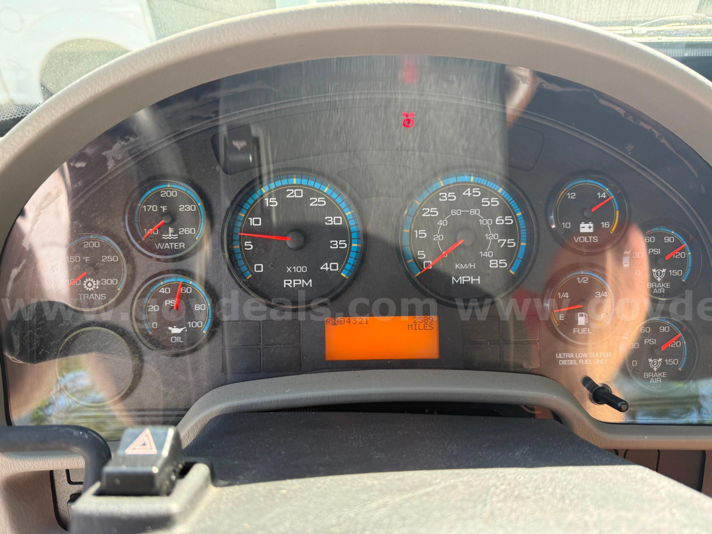 Dashboard of a 2009 International 4400 showing multiple gauges