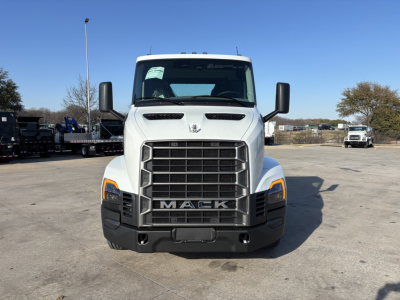 Front view of a white 2027 Mack AN64T conventional daycab truck showing grille, headlights, and Mack emblem.