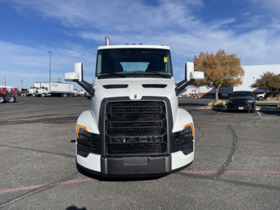 Front view of a new 2026 Mack PR64T conventional daycab truck with prominent grille, headlights, and side mirrors.