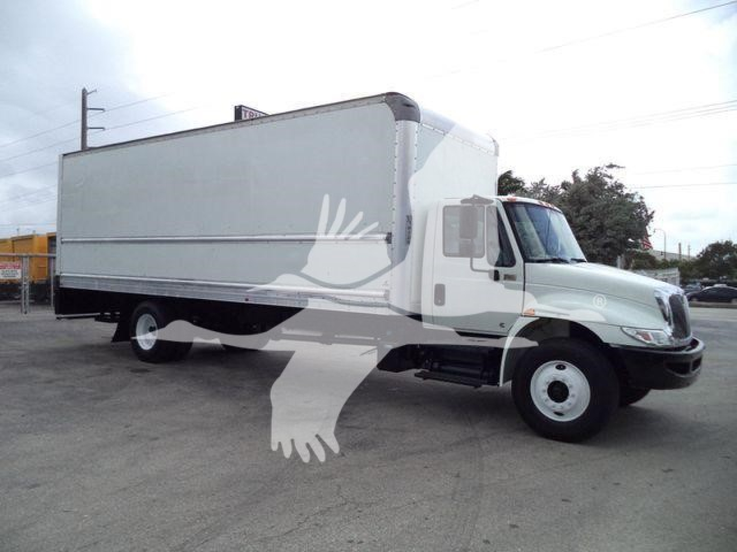 2019 International 4300 box truck viewed from the front-right side showing cargo box and cab.