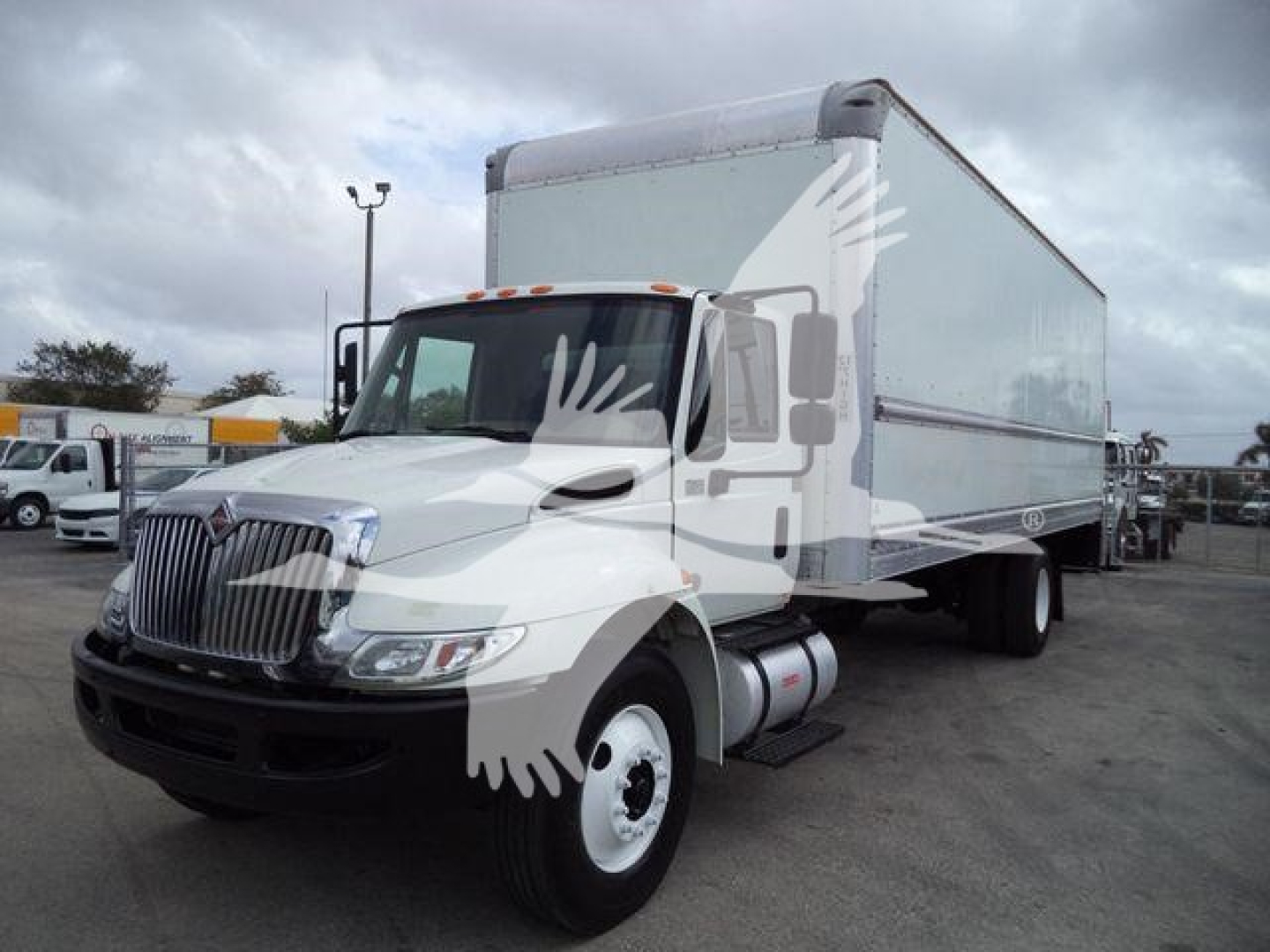 Box truck 2019 International 4300 side view showing cab and box cargo area with stock number T14761FM.