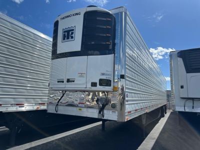 Thermo King reefer trailer front view showing Thermo King unit and refrigerated trailer body.