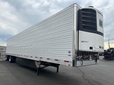 Utility 3000R trailer with Thermo King Reefer unit at front showing side rails and landing gear.