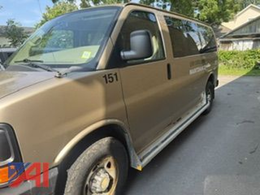 Chevrolet Express LS2500 cargo van side view showing 151 decal and beige paint.