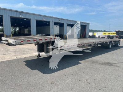Trailer deck showing 2021 Reitnouer dropdeck trailer with long flatbed sections and tandem axles, VIN 1RND48A22MR055343, stock 7251.