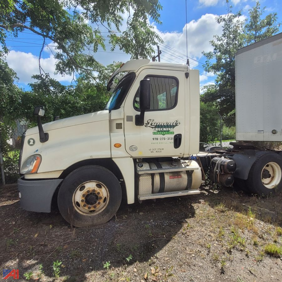 2013 Freightliner Cascadia daycab truck shown in-side view with cream exterior, cab details visible, logo on door reading Lemante? and contact text, left front wheel, attached trailer connection.