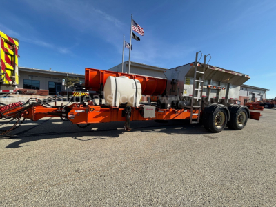 Mack GU granite plow truck trailer showing water tank and hydraulic equipment