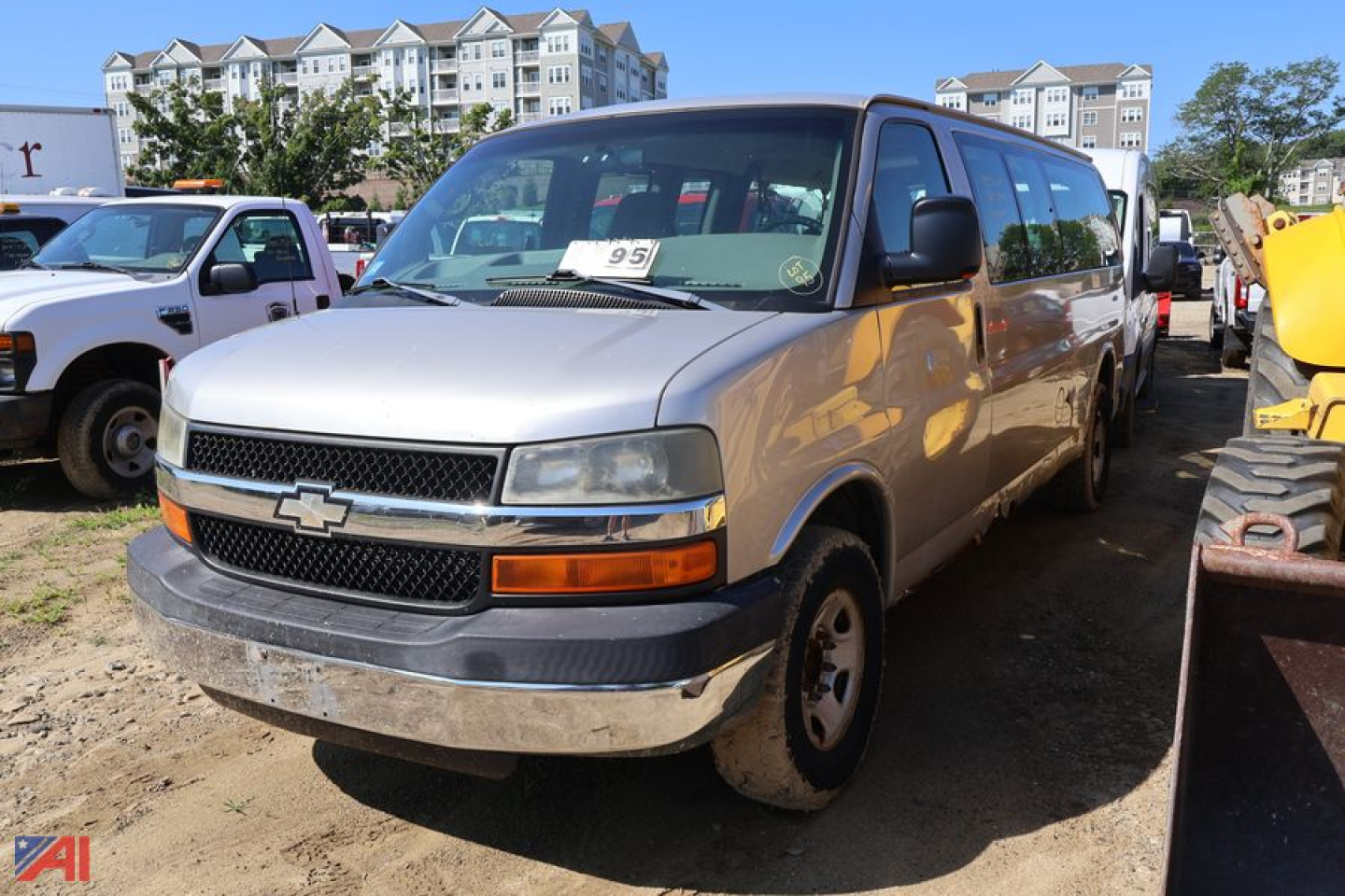 Chevrolet Express 3500 van in service view showing front grille with Chevrolet emblem and side mirrors.