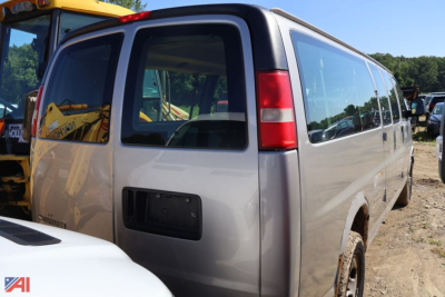 Chevrolet Express 3500 van rear-right view showing cargo van body and windows.