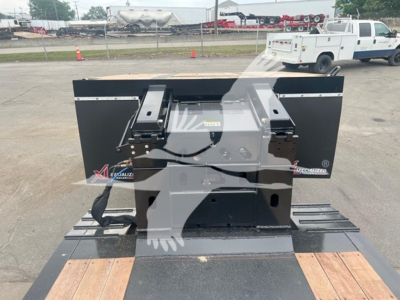 XL Specialized Mini Deck trailer component mounted on a lowboy, with black metal frame and wooden deck planks in foreground, used condition.