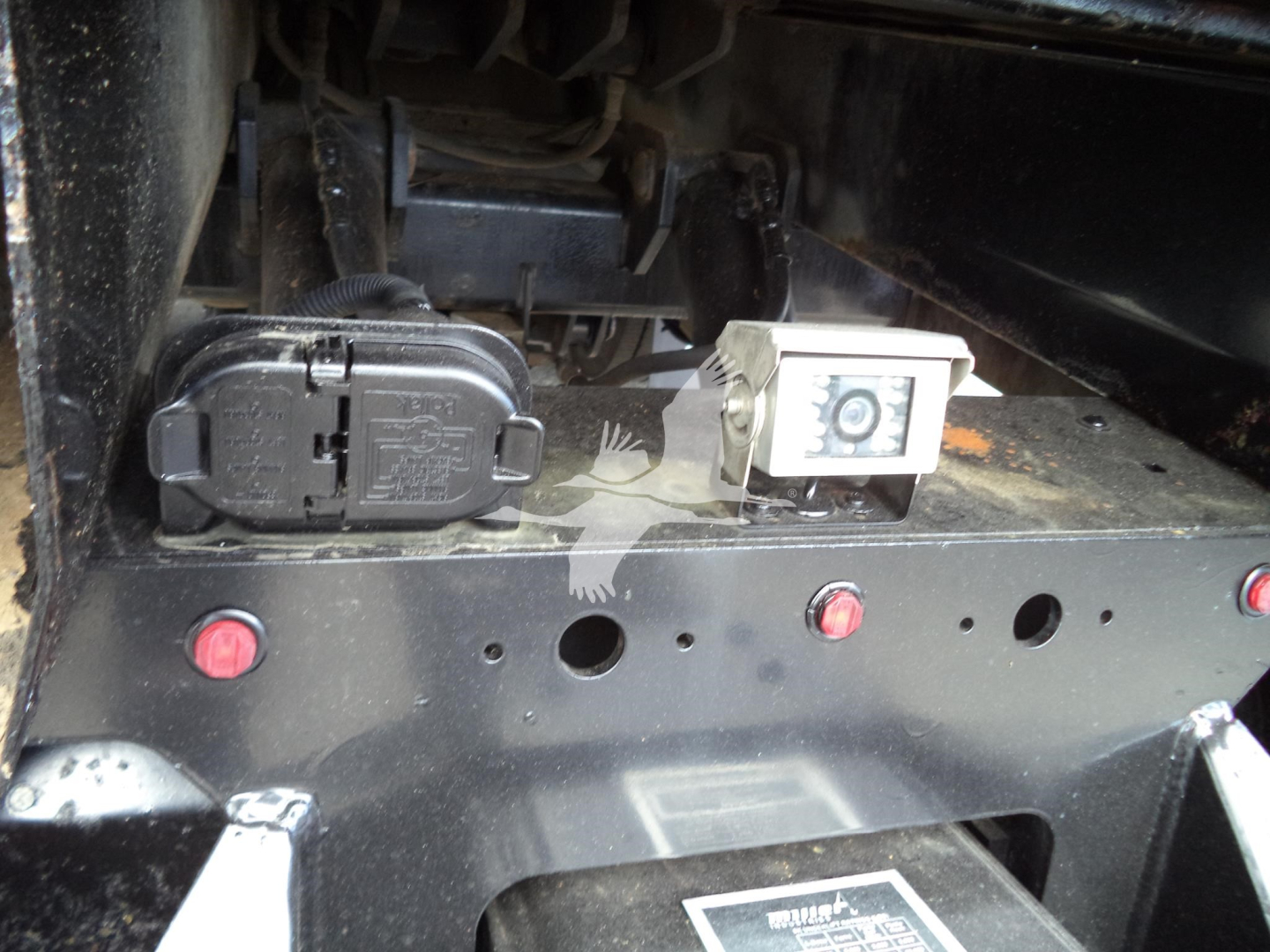 Peterbilt 348 rollback truck rear showing electrical/connectors and power inlet.