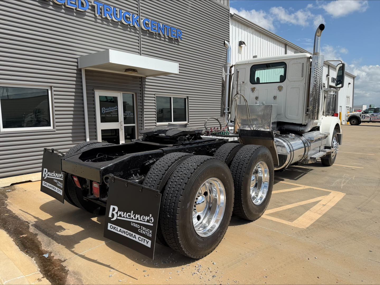 2019 Western Star 4900 SF conventional daycab truck rear/side view showing fifth wheel chassis and dual rear axles.