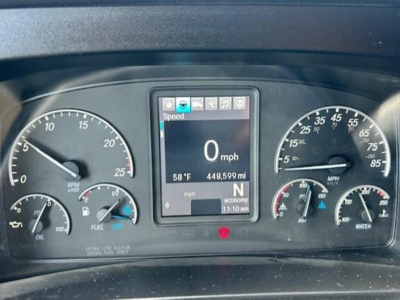 Dashboard of a 2023 Freightliner Cascadia 126 showing digital display with speed 0 mph, and analog gauges for RPM, fuel, oil, temperature, and water.