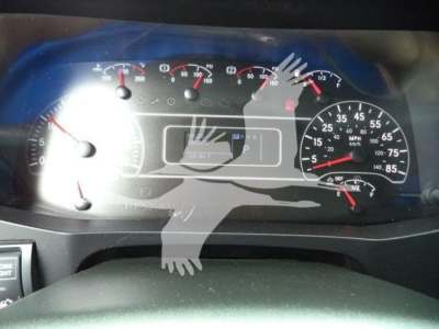 Dashboard of a 2020 International MV truck showing speedometer, tachometer, and digital display with various gauges.
