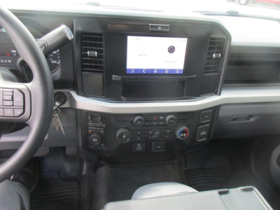 Ford F-550 dashboard center console showing touchscreen infotainment system and climate controls.