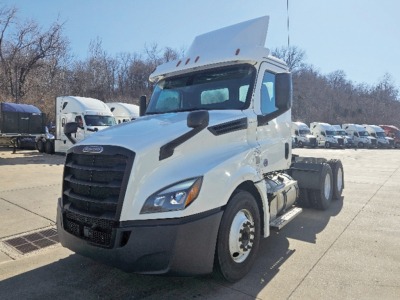 White 2020 Freightliner Cascadia126 daycab truck front-left view showing raised roof sleeper and bumper, with VIN and stock info not visible in image.