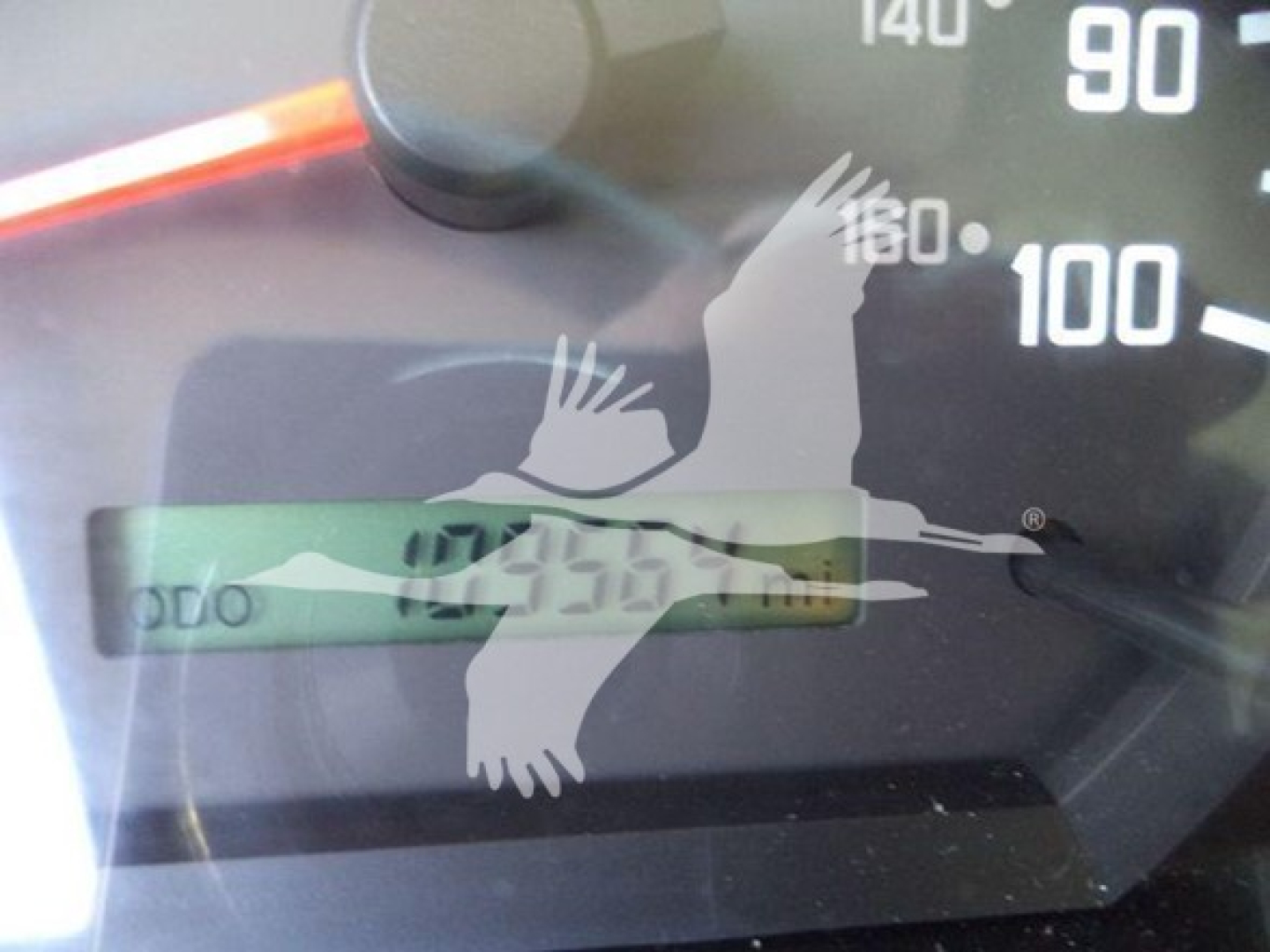 Isuzu NPR-HD dashboard/odometer showing 04356? miles and speedometer markings.
