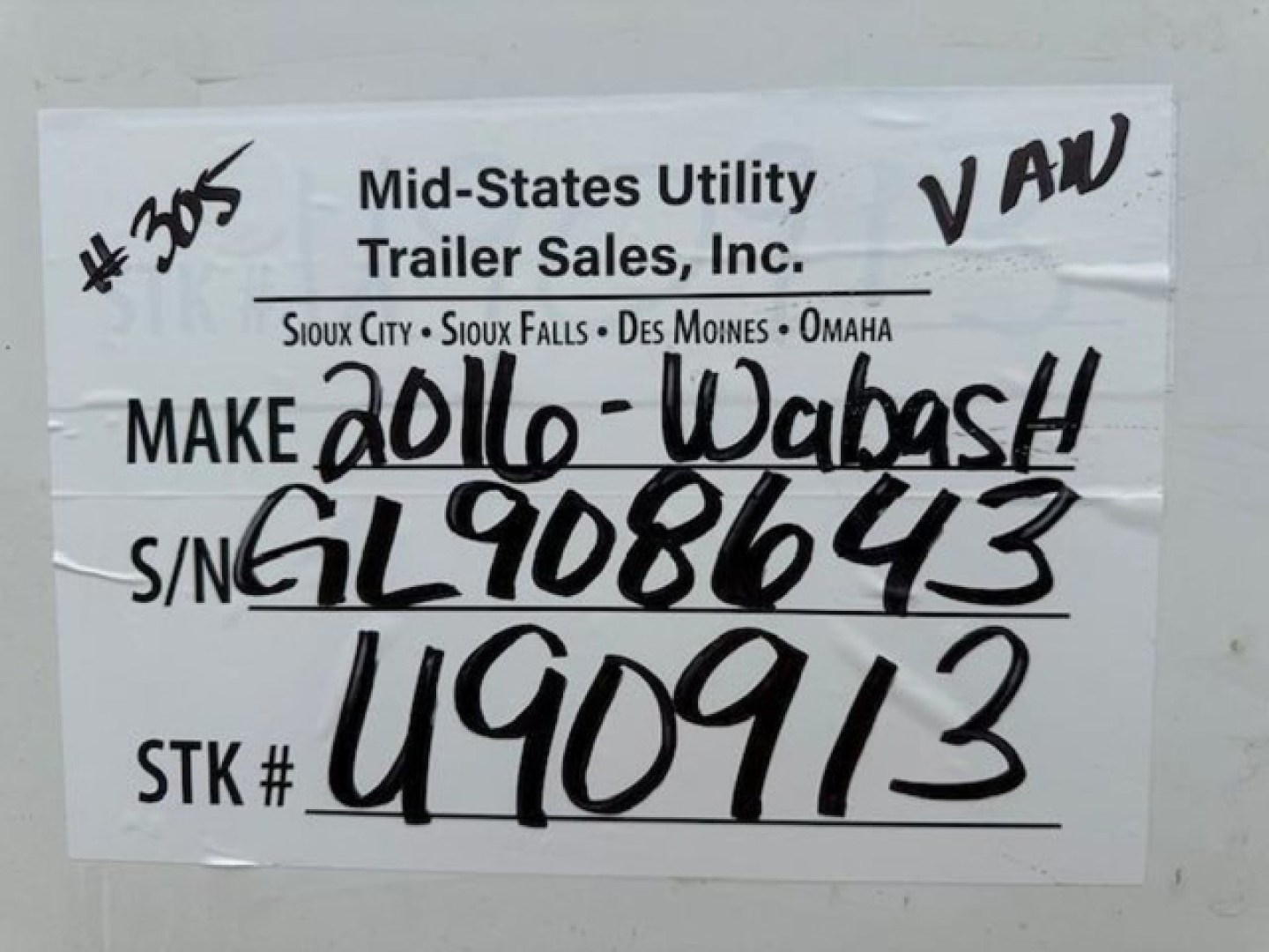 Sign reads Mid-States Utility Trailer Sales, Inc. Sioux City - Sioux Falls - Des Moines - Omaha. Make 2016 Wabash S/N GL908643 STK # U90913. Marked #305 VAW.