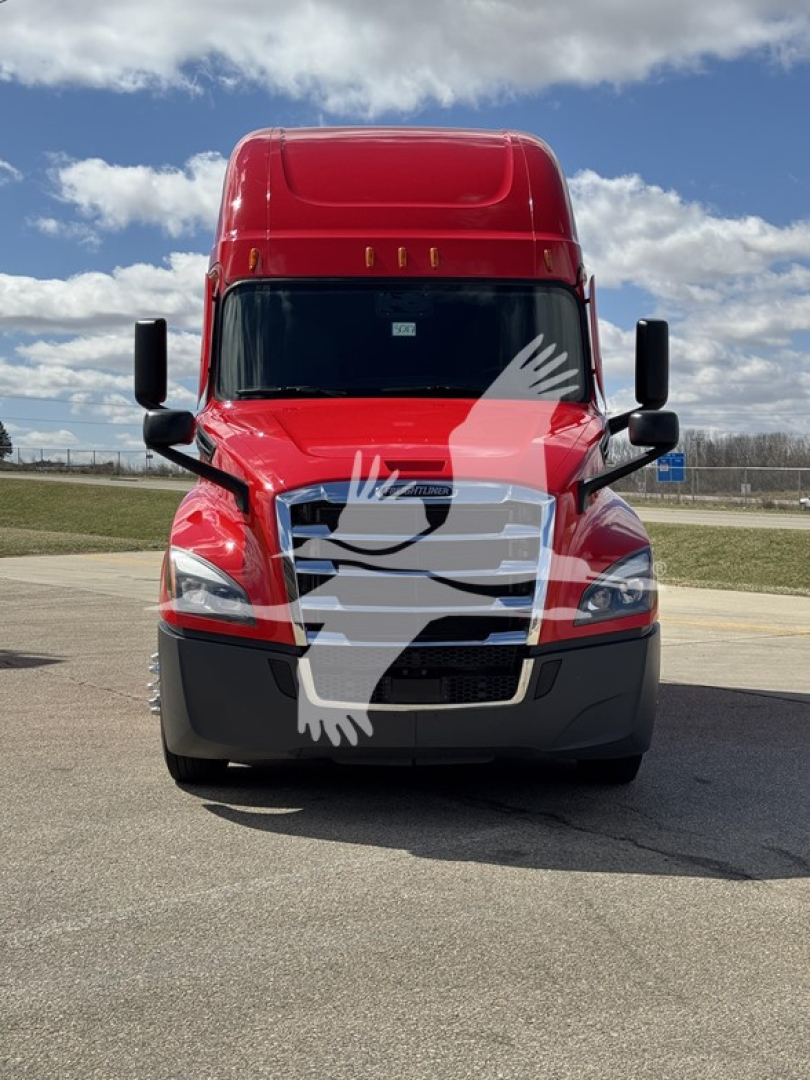 Front view of a red 2023 Freightliner Cascadia 126 conventional sleeper truck with black lower bumper, large windshield, and side mirrors.