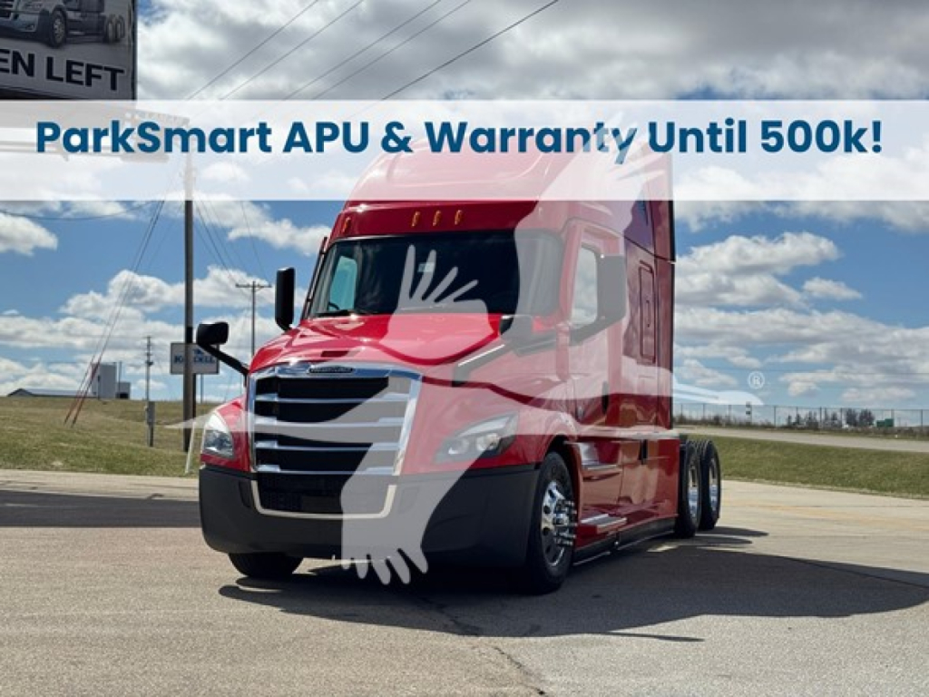 Freightliner Cascadia 126 truck in red exterior, front view in parking lot with ParkSmart banner overlay