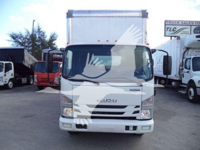 Isuzu NPR HD box truck front view showing cab and cargo box with Isuzu badge and grille, daytime outdoor lot.