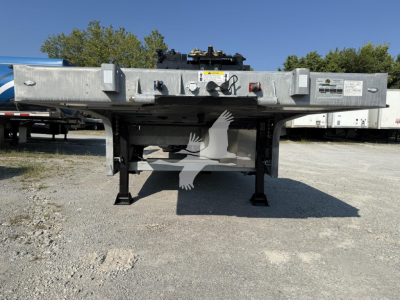 Landoll 440 trailer frame with landing gear and deck hardware visible, side rails and front attachment area in view.