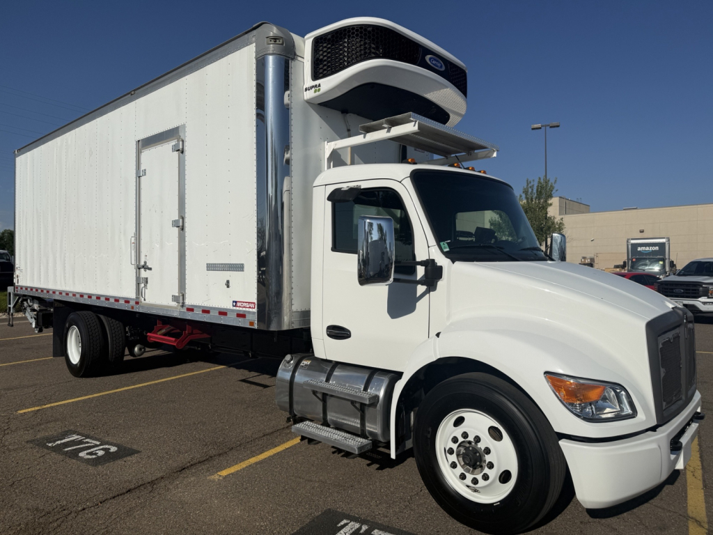 Kenworth T380 refrigerated truck in-service showing cab and box with front-mounted cooling unit and white exterior.