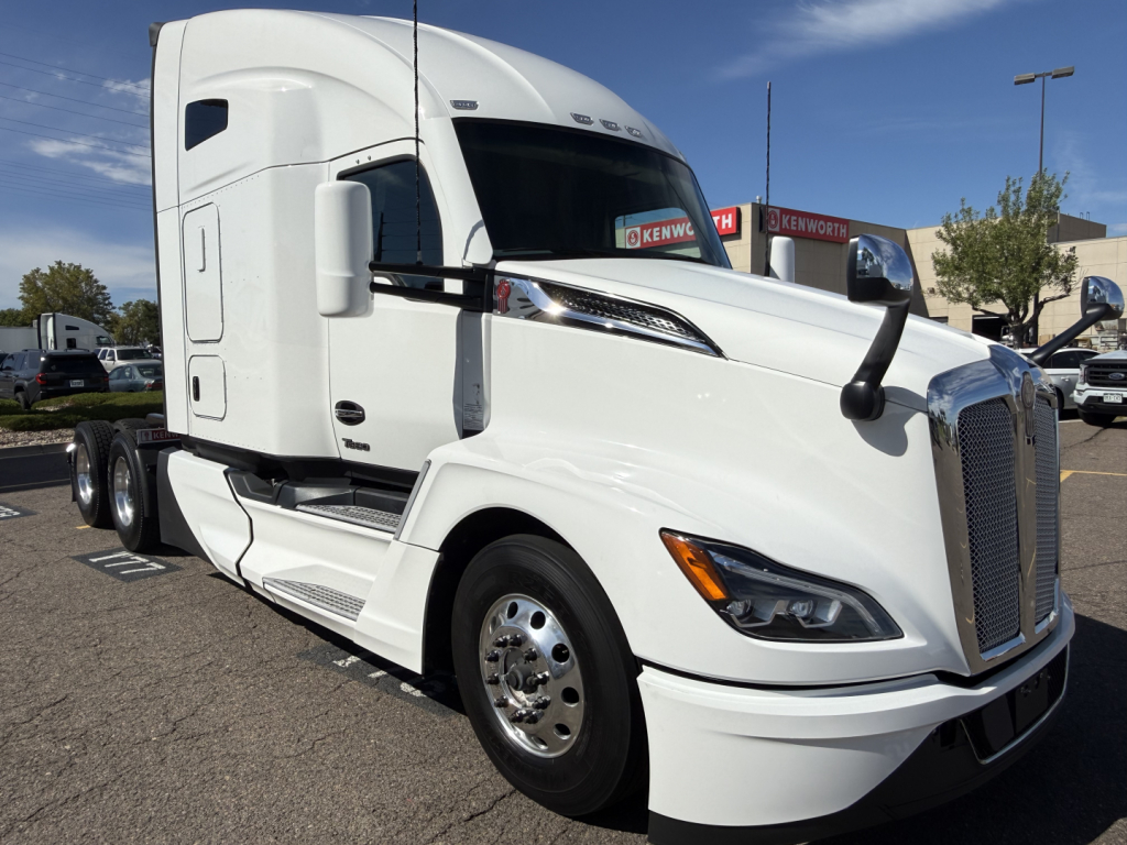 Kenworth T680 truck cab showing exterior and front grille with headlights and mirrors