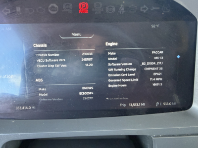 Dashboard screen showing engine, chassis, and software details for a Kenworth truck. Visible text includes Engine Make: PACCAR, Model MX-13, Software Version B2D_15.004_217J, SW Running Change CMPNEN 38, Emission Cert Level EPA-21, Gov Cert