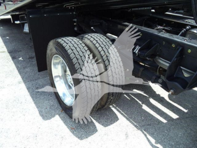 Ram 5500 truck rear dual wheels showing suspension and chassis components