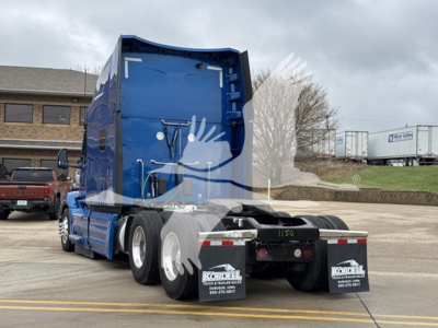Peterbilt 579 cab tractor rear view showing blue sleeper with stock number 2511150 and rear fenders. Visible text on mudflaps: Kordell.