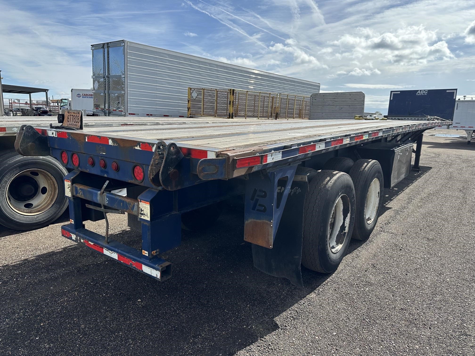 2015 Transcraft Steel Closed Tandem Flatbed W Fork Lift Kit