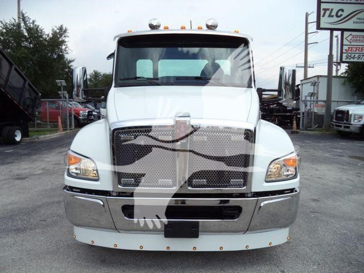 Kenworth T280 front view in white with grille, headlights, and chrome bumper; stock number KW1STEPSIDEWHT visible in listing context