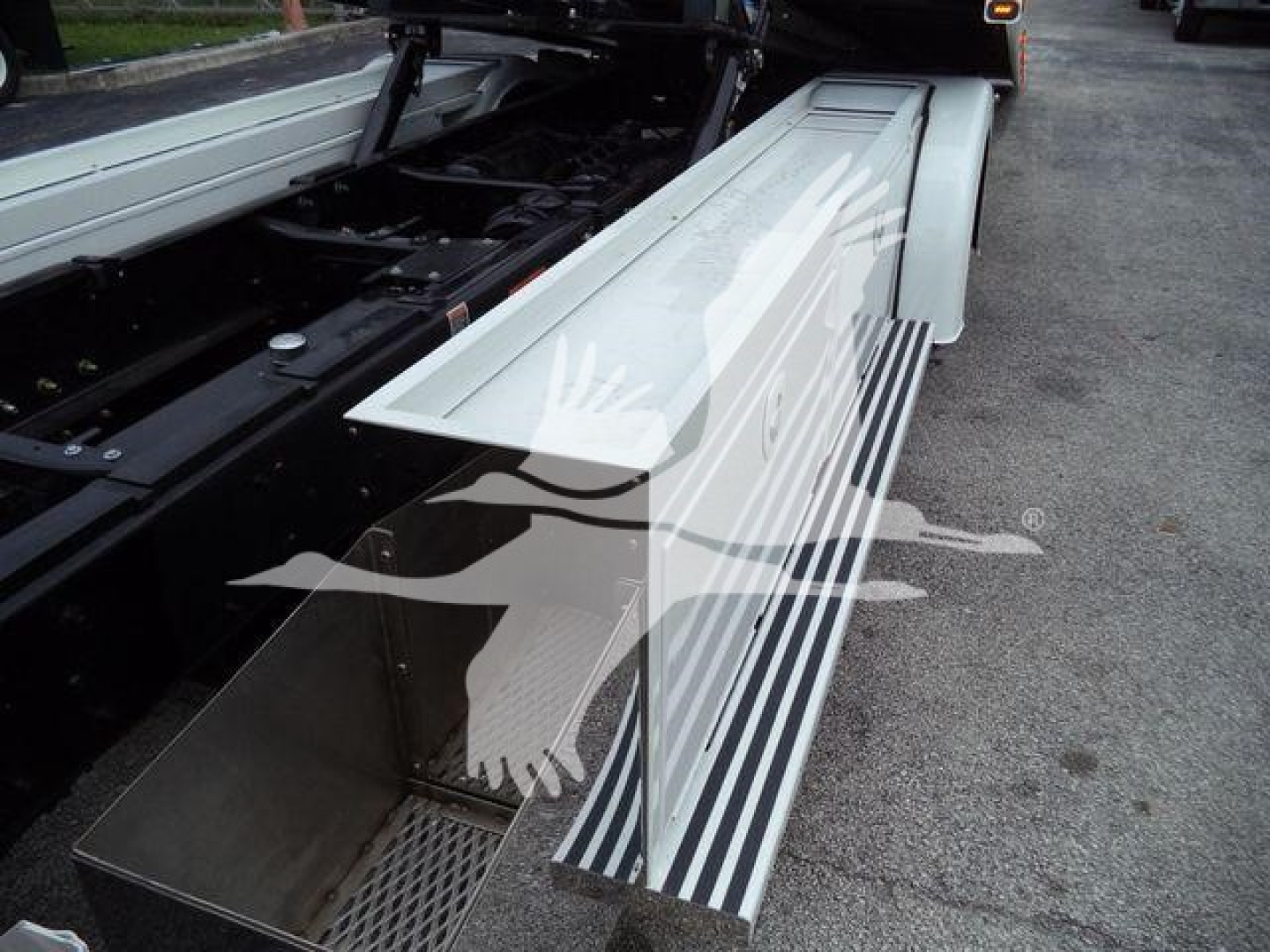 Kenworth T280 rollback truck side steps with white and black striped running board and chrome step,