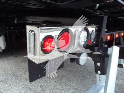 Rear of a 2025 Kenworth T280 rollback truck showing chrome bumper with red and white circular taillights and control lights.