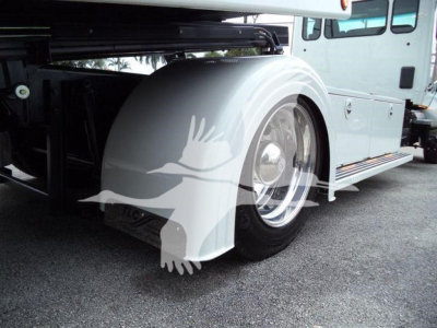 Kenworth T280 truck rear wheel and fender showing white paint and rollback body attachment