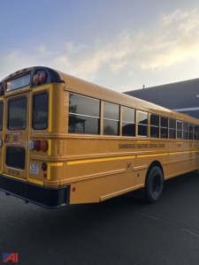 School bus showing BAINBRIDGE-GUILFORD CENTRAL SCHOoL branding on side and tail lights.