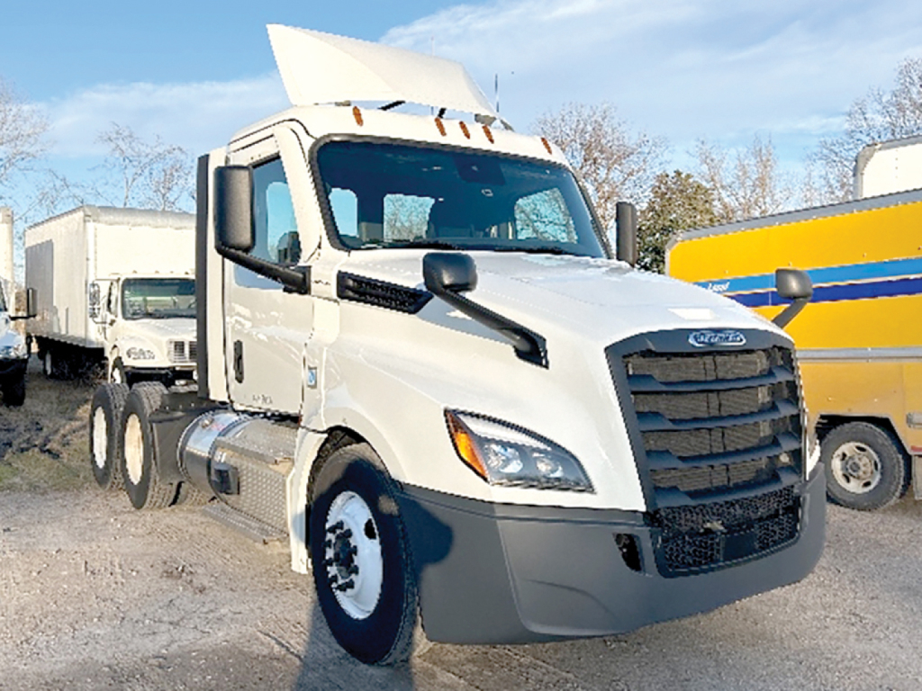 Freightliner Cascadia126 truck tractor in white, front three-quarter view, with sleeper cab and aerodynamic grille.