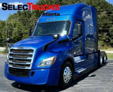 Truck cab image: blue 2022 Freightliner Cascadia 126 sleeper with SelectTrucks Atlanta branding, front grille and headlight details visible.