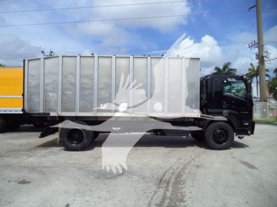 Isuzu FTR truck with a large dump body in a side profile view.