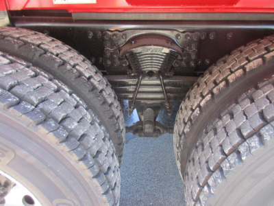 Western Star 47X rear view showing suspension, drive axles, and dual tires.